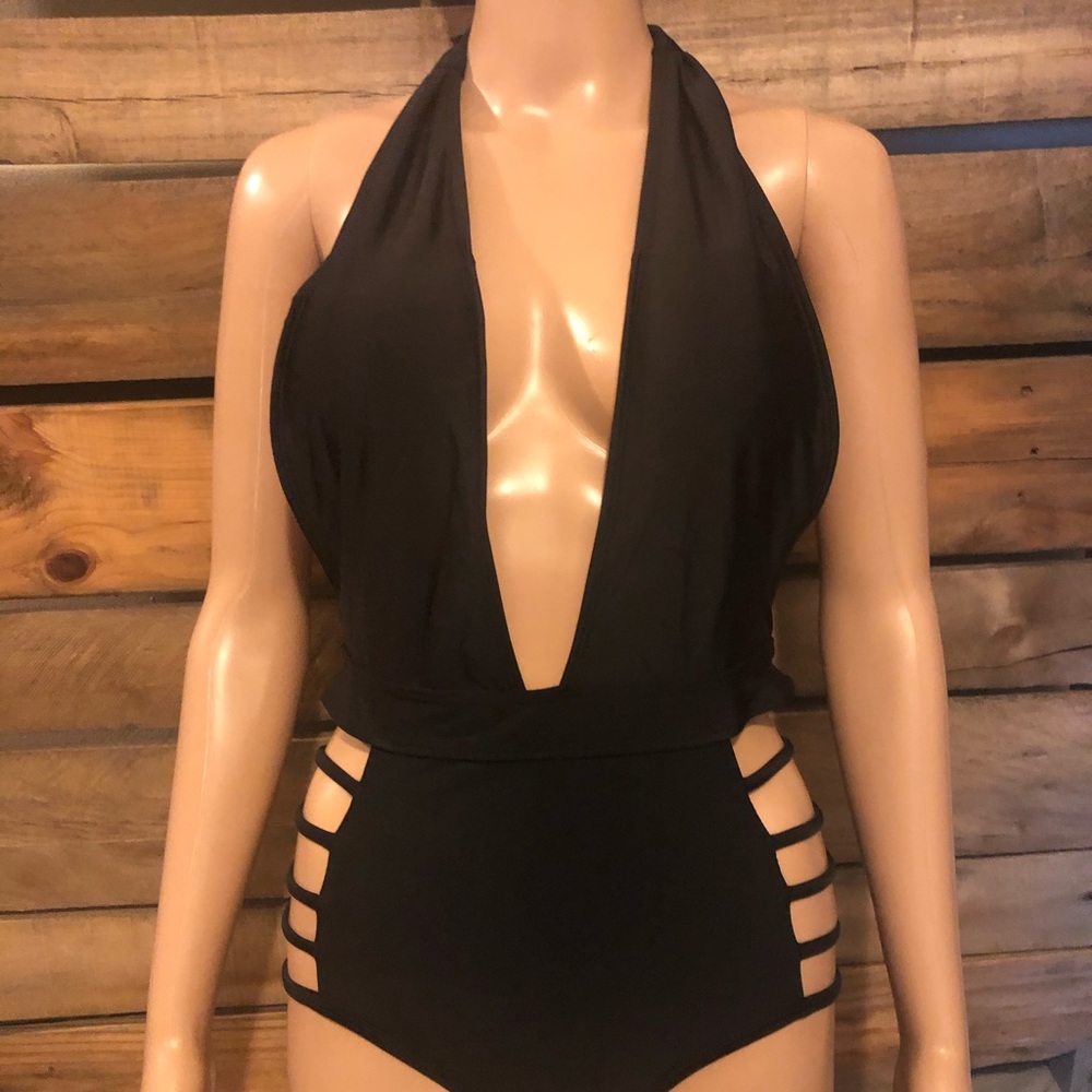 Black one piece swimsuit with plunging neckline